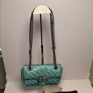 Gucci GG Marmont mini sequin shoulder bag in an aqua